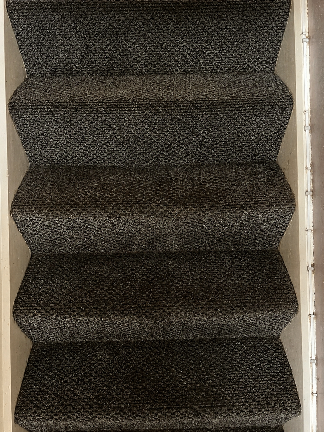 Stained hallway carpet cleaned in Stafford, before professional cleaning